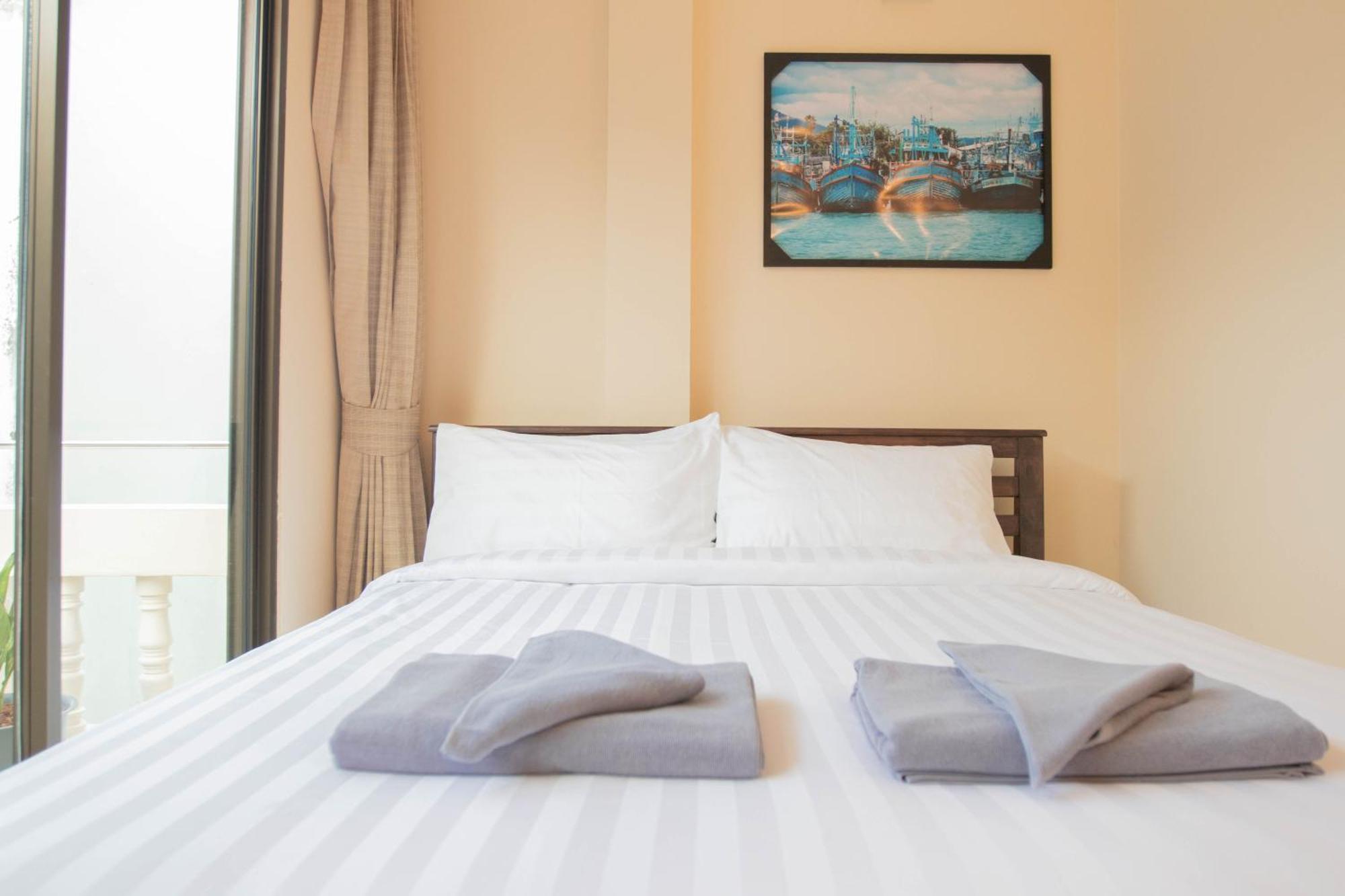Maiiam Guesthouse Patong Bagian luar foto